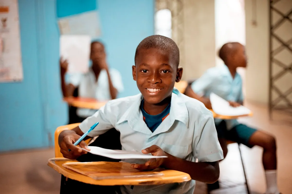 A student in a bright classroom at a Nigerian private school