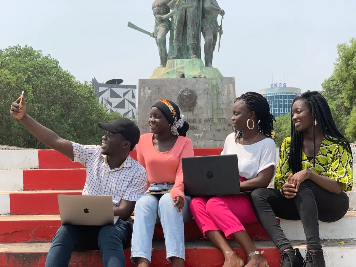 Students using laptops at a modern Nigerian school